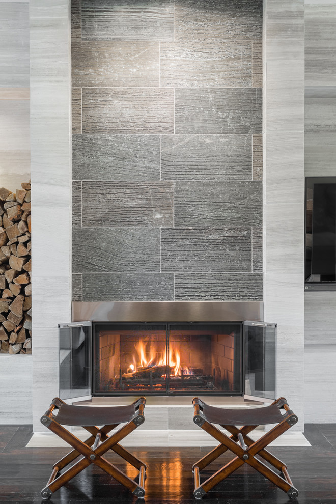 Living Room with Limestone Walls and Textured Stone Fireplace